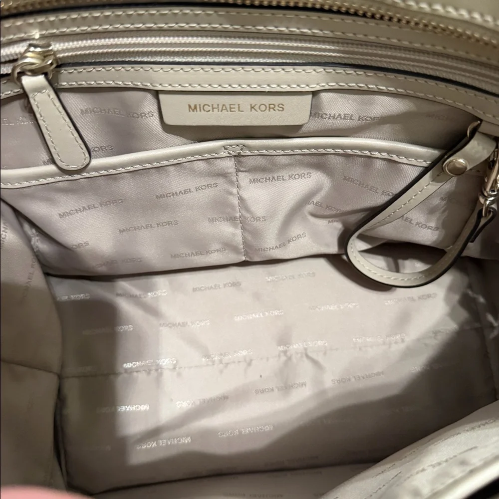 Beige medium sized Michael Kors handbag